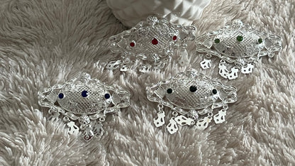 Broches 9