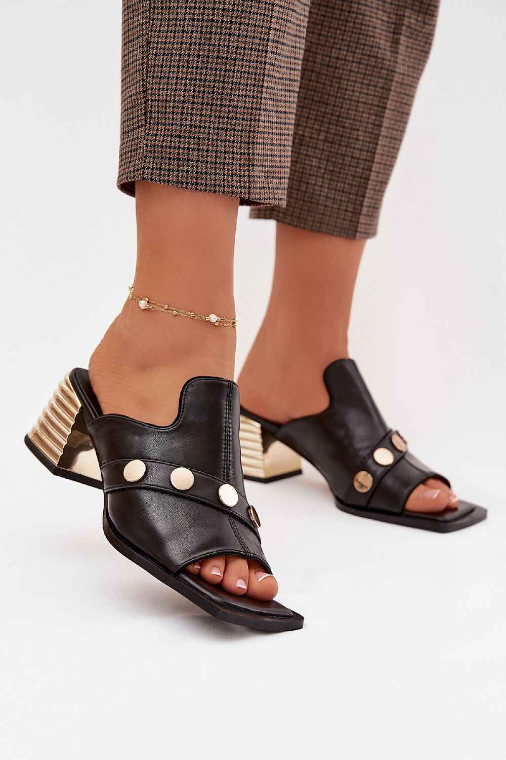 Des mules à talons Step in style