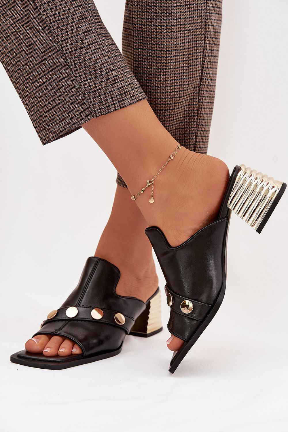 Des mules à talons Step in style