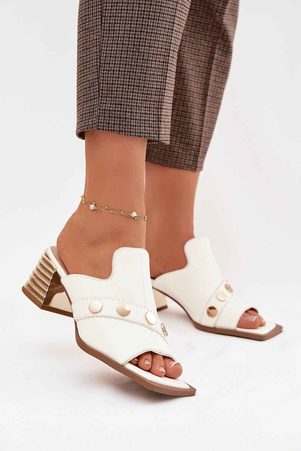 Des mules à talons Step in style